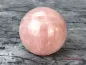 Preview: Hexenshop Dark Phönix Rosenquarz Halbedelsteinkugel Ø 8,5cm