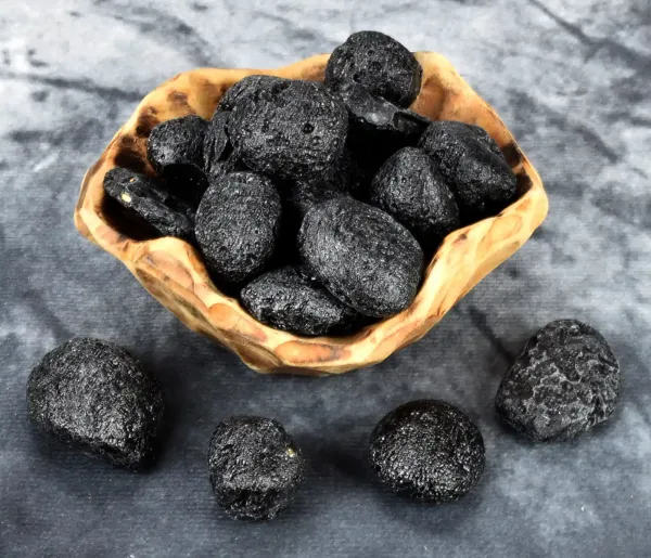 Hexenshop Dark Phönix Tektit Trommelstein Halbedelstein