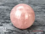 Hexenshop Dark Phönix Rosenquarz Halbedelsteinkugel Ø 8,5cm